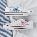 Kawaii disney stitch sapatos de lona de alta qualidade/baixa dos desenhos animados graffiti versátil sapatos esportivos para homens e mulheres moda sapatos planos