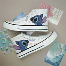Kawaii disney stitch sapatos de lona de alta qualidade/baixa dos desenhos animados graffiti versátil sapatos esportivos para homens e mulheres moda sapatos planos